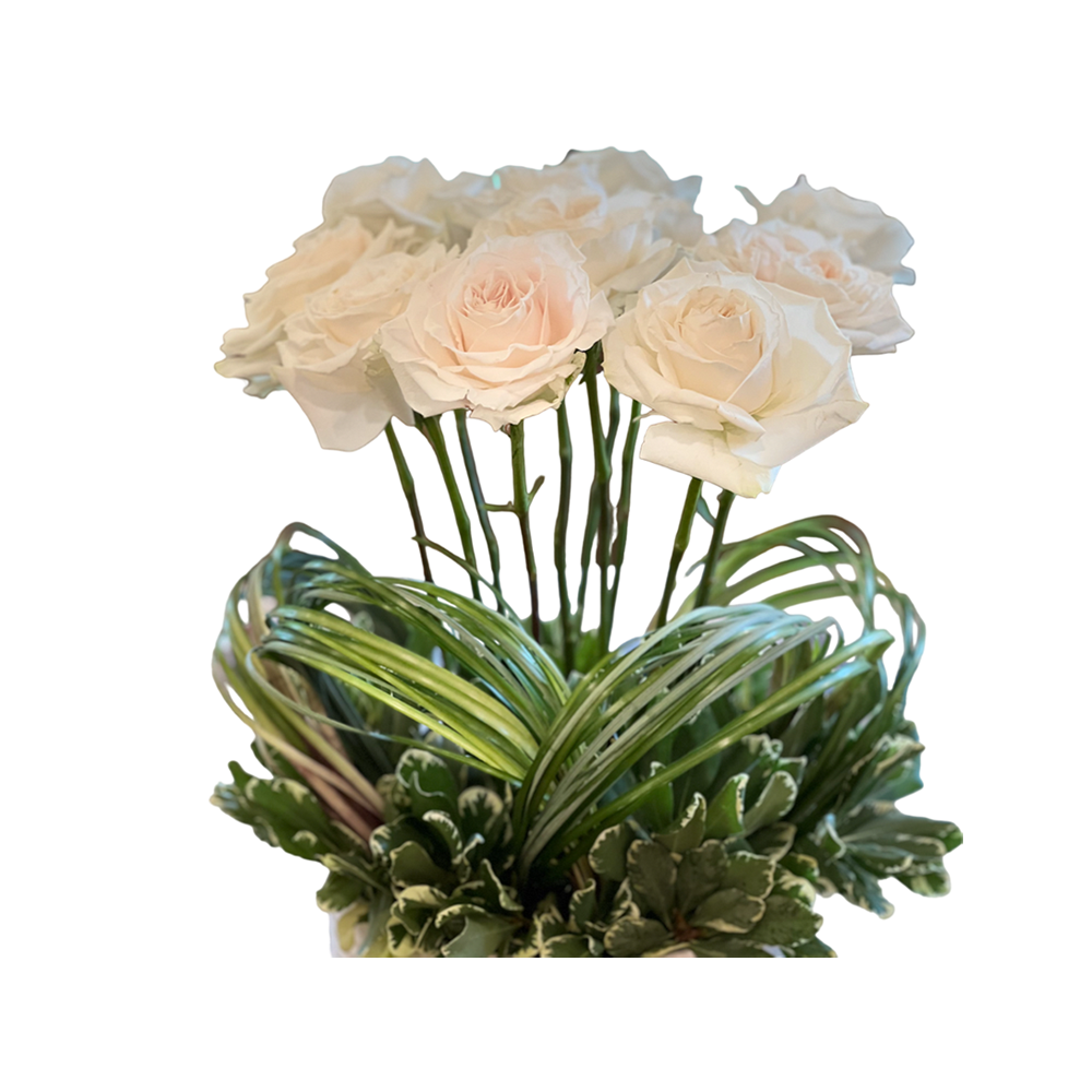 White Roses in a weave bowl setting.